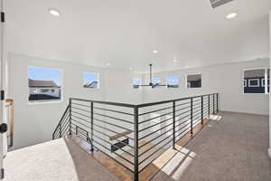 Loft Space with Modern Railing. Photo is of a Completed Willow Plan in a Different Location.  Options and Colors will Vary.