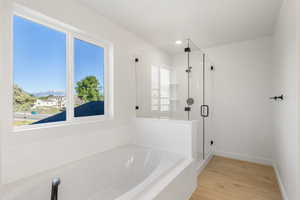 Extra Large Soaker Tub and Full Euro Shower Enclosure.  Photo is of a Completed Willow Plan in a Different Location.  Options and Colors will Vary.