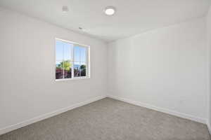 Secondary Bedroom.  Photo is of a Completed Willow Plan in a Different Location.  Options and Colors will Vary.