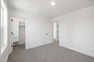 Secondary Bedroom.  Photo is of a Completed Willow Plan in a Different Location.  Options and Colors will Vary.