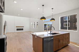 Large Island.  Light and Bright Great Room! Photo is of a Completed Willow Plan in a Different Location.  Options and Colors will Vary.