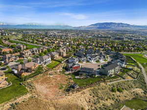 Drone / aerial view featuring a mountain view and a residential view