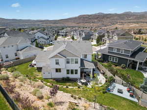 Aerial view of residential area with a mountain backdrop