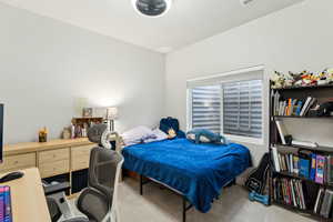 Bedroom featuring carpet flooring
