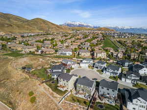 Birds eye view of property featuring a residential view and a mountain view