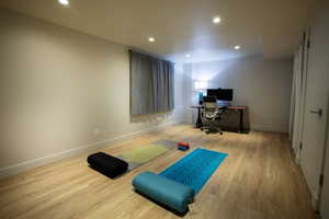 Office featuring recessed lighting, baseboards, and wood finished floors