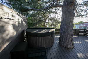 Deck featuring a hot tub
