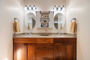 Bathroom with double vanity and a sink