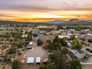 Aerial view at dusk with a mountain view and a residential view
