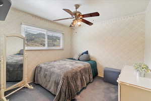 Bedroom featuring carpet floors and ceiling fan