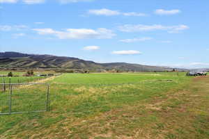 View of mountain feature with a rural view