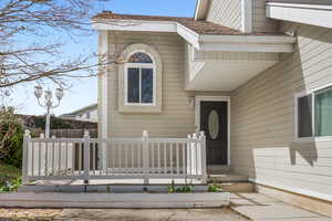 Entrance to property featuring fence