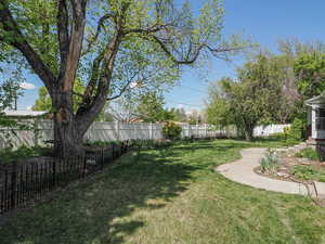 View of yard with a fenced backyard