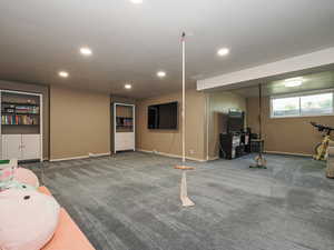 Recreation room featuring recessed lighting, carpet, and baseboards