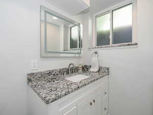 Bathroom featuring vanity