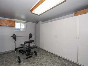 Exercise room featuring baseboards