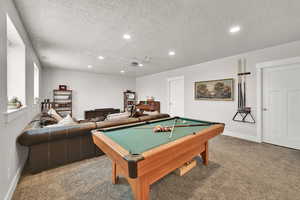 Game room with baseboards, billiards, recessed lighting, a textured ceiling, and carpet flooring