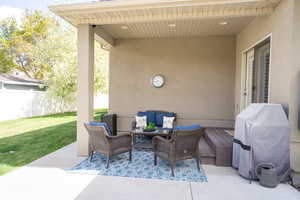 View of patio / terrace featuring fence, area for grilling, and outdoor lounge area