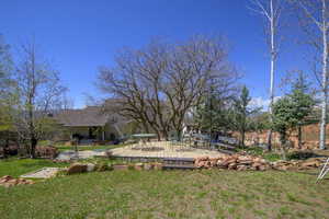 View of yard featuring a deck