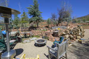 View of yard with a fire pit
