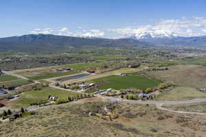 Aerial view featuring a mountain view and a rural view