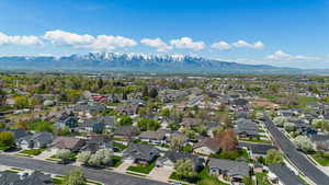 Aerial view featuring a mountain view and a residential view