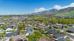 Drone / aerial view with a residential view and a mountain view