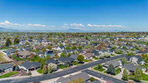 Drone / aerial view with a residential view and a mountain view