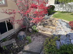 View of yard featuring fence