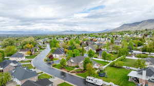 Birds eye view of property featuring a residential view and a mountain view