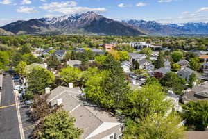 Drone / aerial view with a residential view and a mountain view