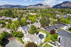 Birds eye view of property with a residential view and a mountain view