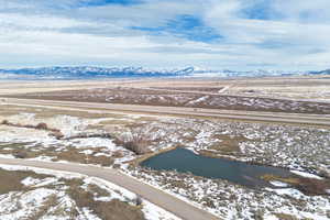 Snowy aerial view with a mountain view