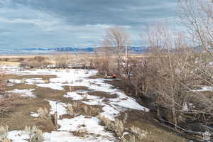 View of yard featuring a mountain view