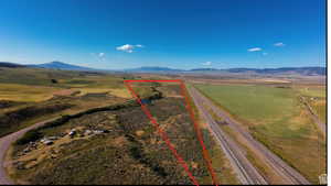 Drone / aerial view featuring a rural view and a mountain view
