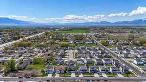 Birds eye view of property featuring a mountain view and a residential view