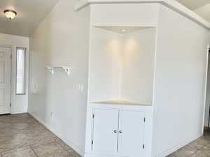 Foyer featuring baseboards