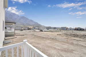 Property view of mountains featuring a residential view