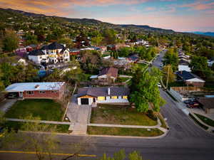 Aerial view at dusk with a mountain view and a residential view