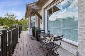 Inviting front deck with two front entry staircases.