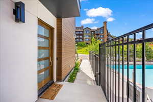 Exterior space featuring a fenced in pool and fence