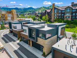 Exterior space with a mountain view and a garage