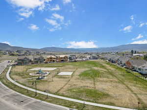 Aerial view featuring a mountain view and a residential view