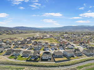 Birds eye view of property featuring a residential view and a mountain view