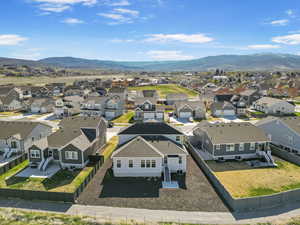 Drone / aerial view featuring a mountain view and a residential view