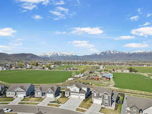 Drone / aerial view with a residential view and a mountain view