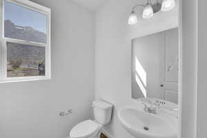 Bathroom with a sink and toilet
