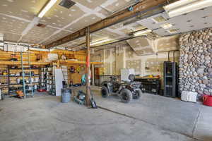 Garage featuring a workshop area