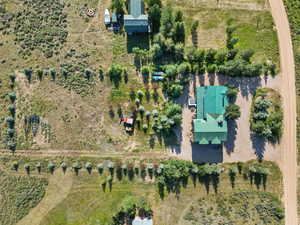 Birds eye view of property featuring a rural view