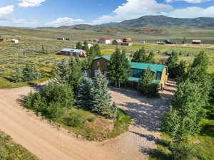 Aerial view with a mountain view and a rural view